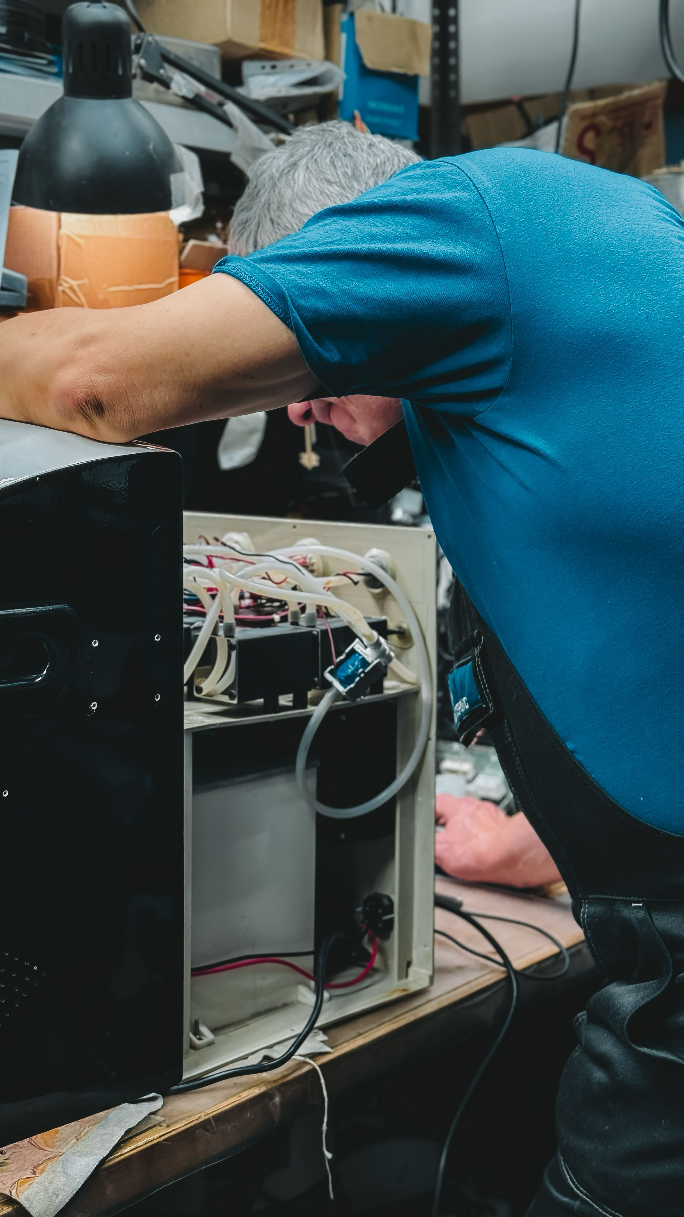 Technician working on an appliance